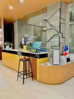 an office with a desk with a laptop computer on a counter at Skyport Hotel in Manila