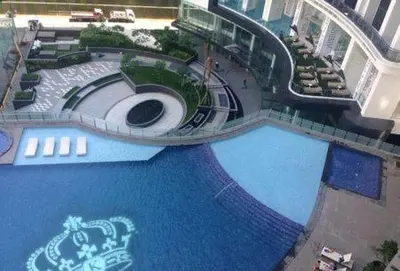 an aerial view of a swimming pool in a building at David Gelber in Manila