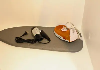 a mouse and a mouse pad with a computer mouse at The Brass Burrow, Bel Air Soho Suites in Manila