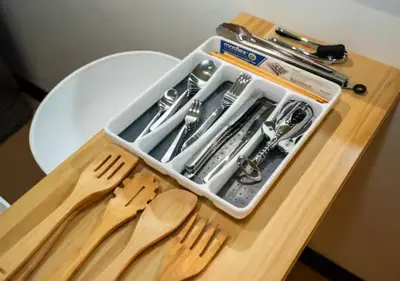 a tool box sitting on top of a table with utensils at Villa Verde, Tivoli Garden Residences in Manila