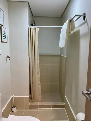 a bathroom with a shower with a shower curtain at Condo unit near SM City Sta Rosa unit 3 in Santa Rosa