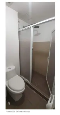 a bathroom with a toilet and a shower at Avida Towers Intima Paco, Manila Studio Unit in Manila
