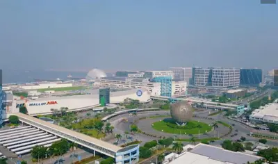 an aerial view of a city with a large building at My Serenity Suite in Manila