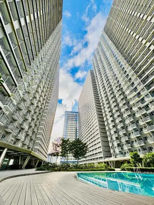 a view of two tall buildings in a city at Serenitude Staycation by Khaila - Fame Residences in Manila