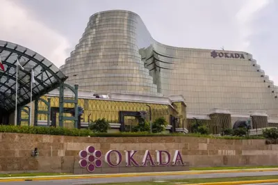a building with a sign in front of it at Lush 2br 98sqm MOA 200mbps Netflix XBOX Printer in Manila
