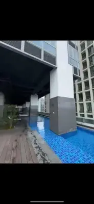 a view of a building with blue water at Superior Studio Eastwood Global Plaza Luxury Residence in Manila