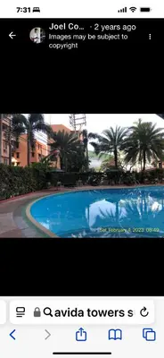 a screenshot of a tv screen with a picture of a swimming pool at Avida sm sucat paranaque in Manila