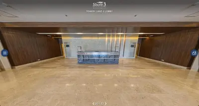a large empty room with a fireplace in a building at MOA Staycation at Shore 3 Residences Tower 1 in Manila