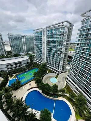 an aerial view of a city with tall buildings at Azure staycation by marco in Manila