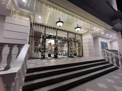 a staircase in a building with christmas decorations at Uptown Parksuite 1 BR Tower 2 BGC Taguig in Manila