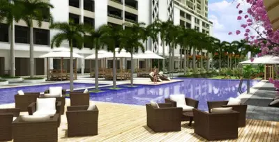 a rendering of a resort pool with chairs and umbrellas at Millionaire Manila Bay Sunset Penthouse views in Manila