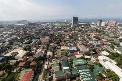 an overhead view of a city with buildings at Millionaire Manila Bay Sunset Penthouse views in Manila