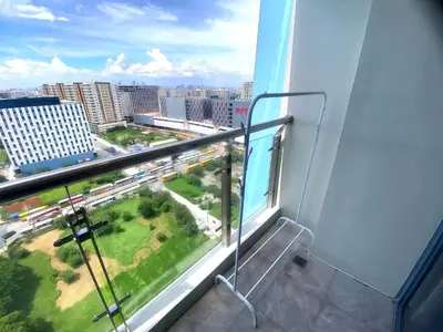 a balcony with a view of a city at City Center Executive Hotel Manila Near Airport, PITX, Solaire, City of Dreams, Okada & Ayala Mall in Manila