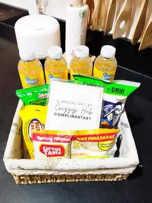 a basket filled with different types of food at Crizzy's Hub Gabrielle at Shore Residences in Manila