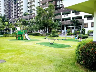 a park with a playground with a play equipment at Millionaire Tropical Paradise Penthouse Royal Palm in Manila