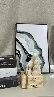 a picture of two people on a stack of books at Newport City across NAIA Terminal 3 by II JDs Aparthotel in Manila