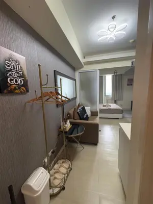 a bathroom with a toilet in a room at Miami 1909 in Manila