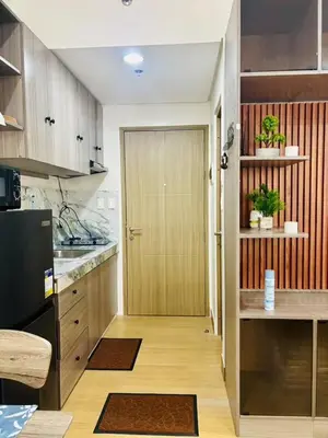 a kitchen with a door leading to a kitchenasteryasteryasteryasteryasteryasteryastery at Balauro's Haven in Trece Martires