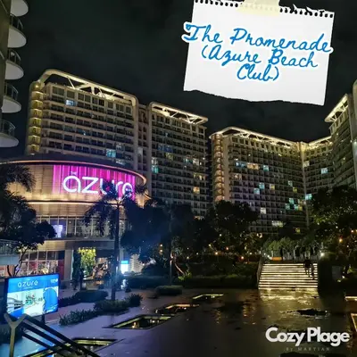 a view of the paramount savannah hotel club at night at Affordable Cozy Plage by Martian in Manila