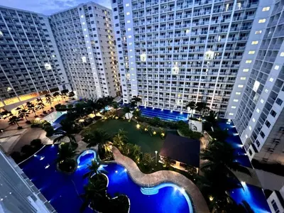 an overhead view of a large building with a swimming pool at Shore B 524 in Manila