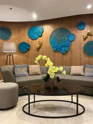 a living room with a couch and a table at Hotel like Condo at Pasay in Manila