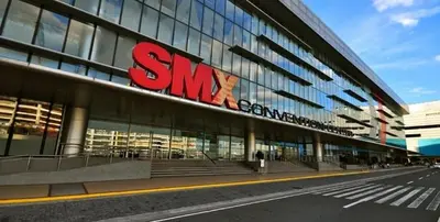 a large building with a sign on the side of it at Mall of Asia - SMDC Shore in Manila
