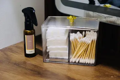 a plastic container filled with noodles next to a knife at Serene Stays at Shore in Manila