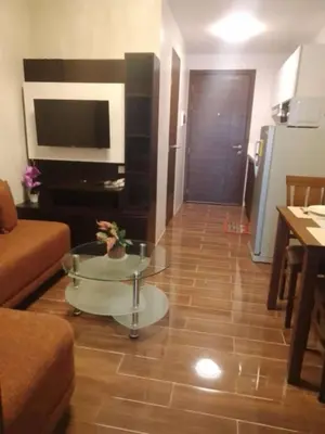 a living room with a couch and a coffee table at Casa Beatrice Staycation in Manila