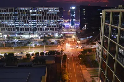 a view of a city at night with buildings at 1BR Room-Stunning MOA view FIREWORKS in Manila