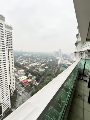 a view of a city from the top of a building at Tower 1 Rm 305 FREE Parking, FREE Pool, Balcony, 1Bedroom 4 beds in Manila