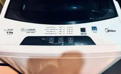 a close up of a toaster oven with its control panel at Luxurious 2 Bedroom Oasis in Air Residences with Bar KTV and Games in Manila