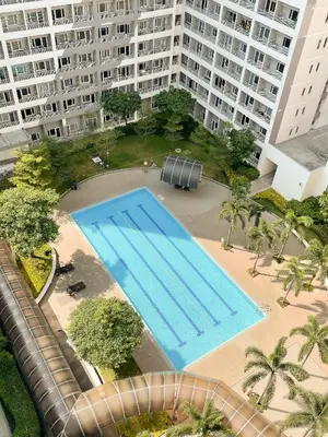 an overhead view of a large swimming pool in a city at Houzz 1548 by Houzztelity in Manila