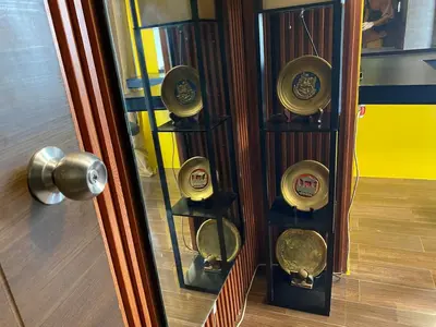a door with a bunch of clocks on it at Air Residence T1 Amazing Makati Luxury Condo 66 sq m 300Mbps Fast in Manila