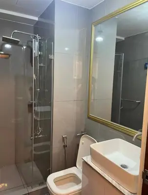 a bathroom with a shower and a toilet and a sink at Air Residence T1 Amazing Makati Luxury Condo 66 sq m 300Mbps Fast in Manila