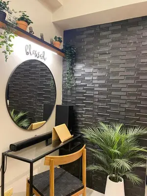a mirror on a wall next to a desk at Twin Oaks near MRT Shaw, Megamall, Shangri-la plaza in Manila