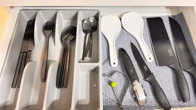a drawer filled with utensils and spatulas at Art & Zen - Azure Staycation in Manila