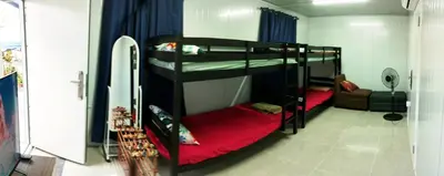 a couple of bunk beds in a room at 40 Guest - Whole compound in Santa Rosa