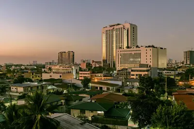 a cityscape of a city with tall buildings at Makati City Centre Condo in Manila