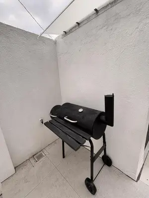a room with a bench in a room with a wall at Villa Serene Resort in General Trias