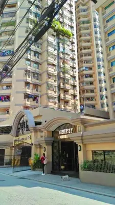 a fire truck parked in front of a building at Somerset Condominium Kitchen Pool NAIA MOA LRT in Manila