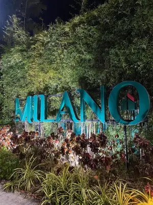 a sign that says miami in a garden at Elegant Escape Milano Bacoor Cavite in Bacoor