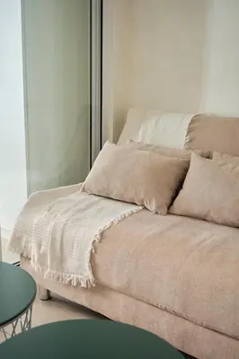 a bed with two pillows on it in a room at Bahamas Tower Azure Urban Resort Residences by Nestled Nook in Manila