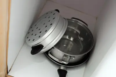 a pot sitting on top of a kitchen counter at Manhattan Heights Modern Studio in Manila