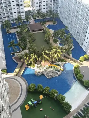 an aerial view of a pool at a resort at Shore residences tower A in Manila