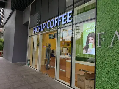 a store front with a sign for a coffee shop at 1BR Condotel with Balcony at FAME Residences #FM10 in Manila