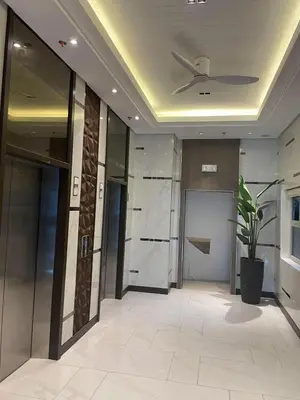 a hallway of a building with a ceiling at D&M cosy staycation in Manila