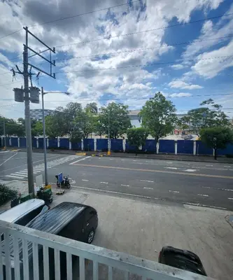a truck parked on the side of a street at MNM Place - Sea Residence 0D in Manila