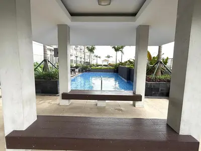 a swimming pool in the middle of a building at 2 Br Condo Apartment near PICC, CCP, WTC & Star City at Coast Residences, Pasay City in Manila