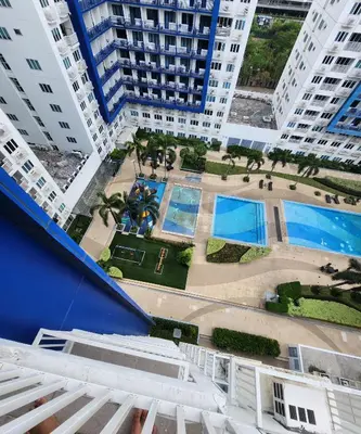 an aerial view of a city with tall buildings at MNM Place - Sea Residence 0F in Manila