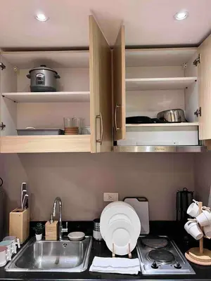 a kitchen with a sink and a counter top at Makati Room 381 1 br deluxe SMJazz T2 residence New in Manila